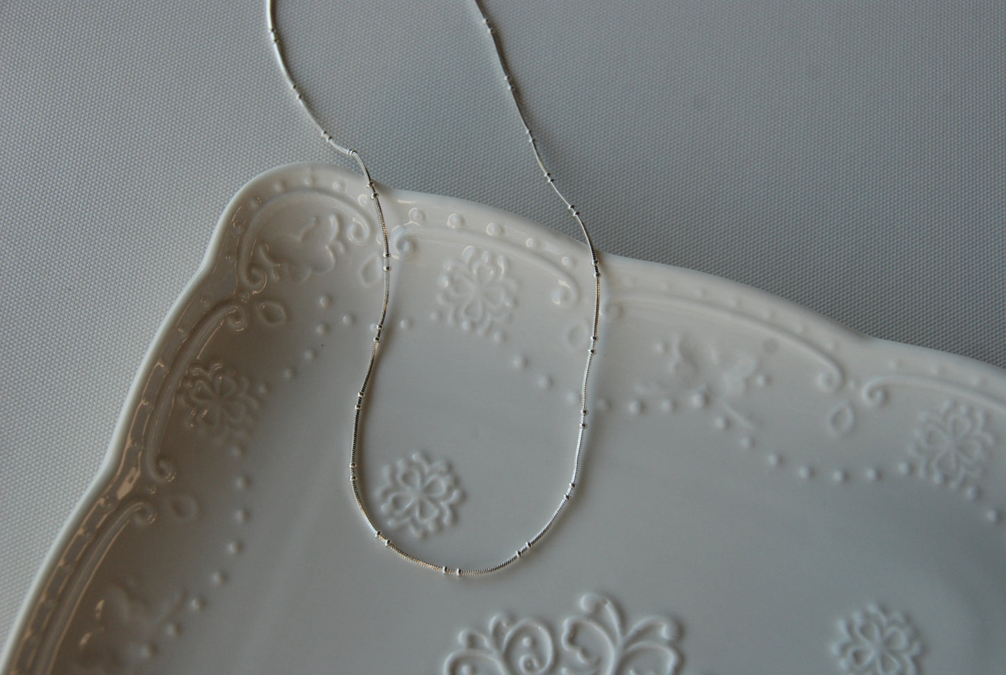 Collar Doble Pelotitas