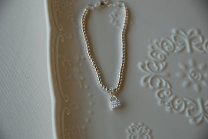Pulsera Pelotitas Candado