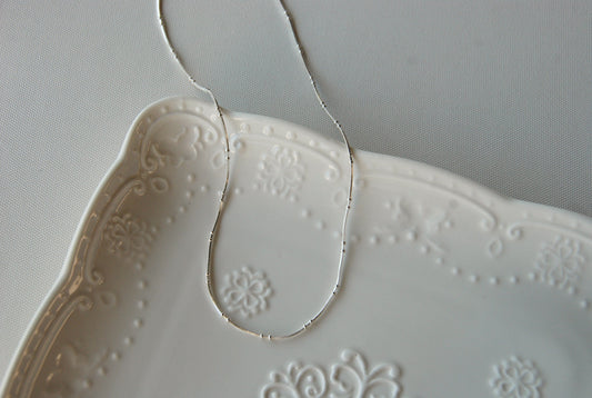 Collar Doble Pelotitas